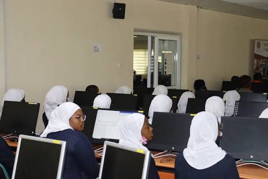 Students receiving their school fee reminders on WhatsApp